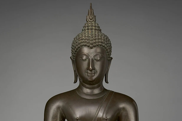 Discover true happiness within yourself with the Buddha's teachings. Let go of attachment and find balance. Learn more about the path to lasting happiness. Image: Buddha statue meditating.